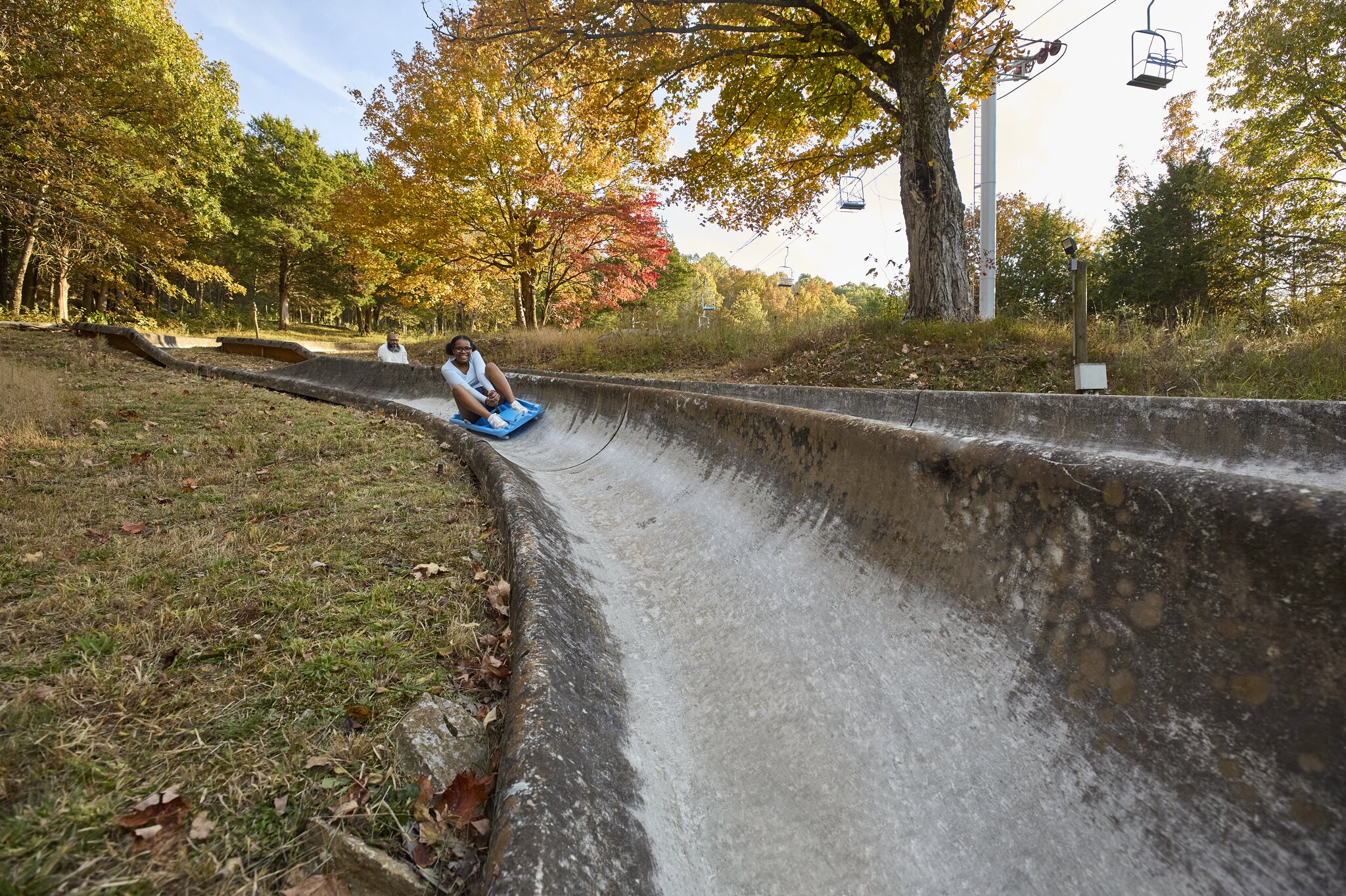 Little girl on the apline slide at Mammoth Valley Park in Kentucky